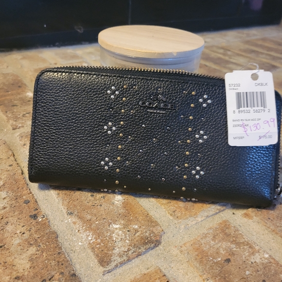 Coach Handbags - Coach wallet. Classic black with an accent of rivets.